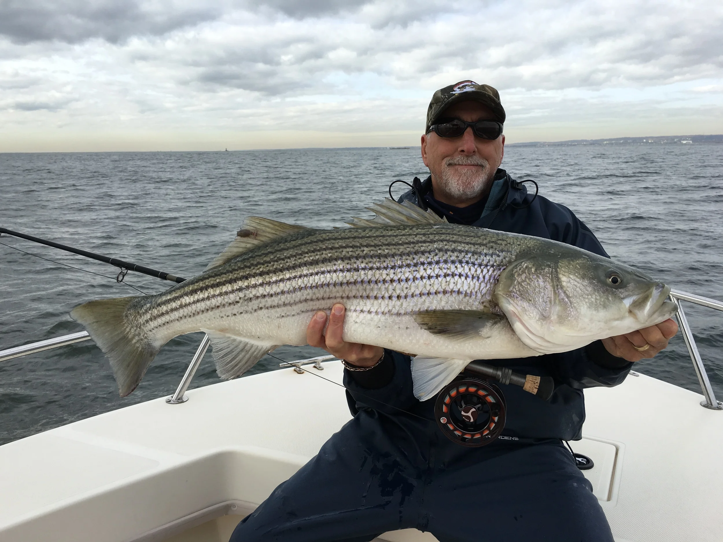 World class angler Michael Roth with a 25+ lb striper