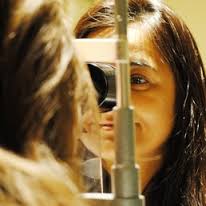 Dr. Kaw doing eye exam