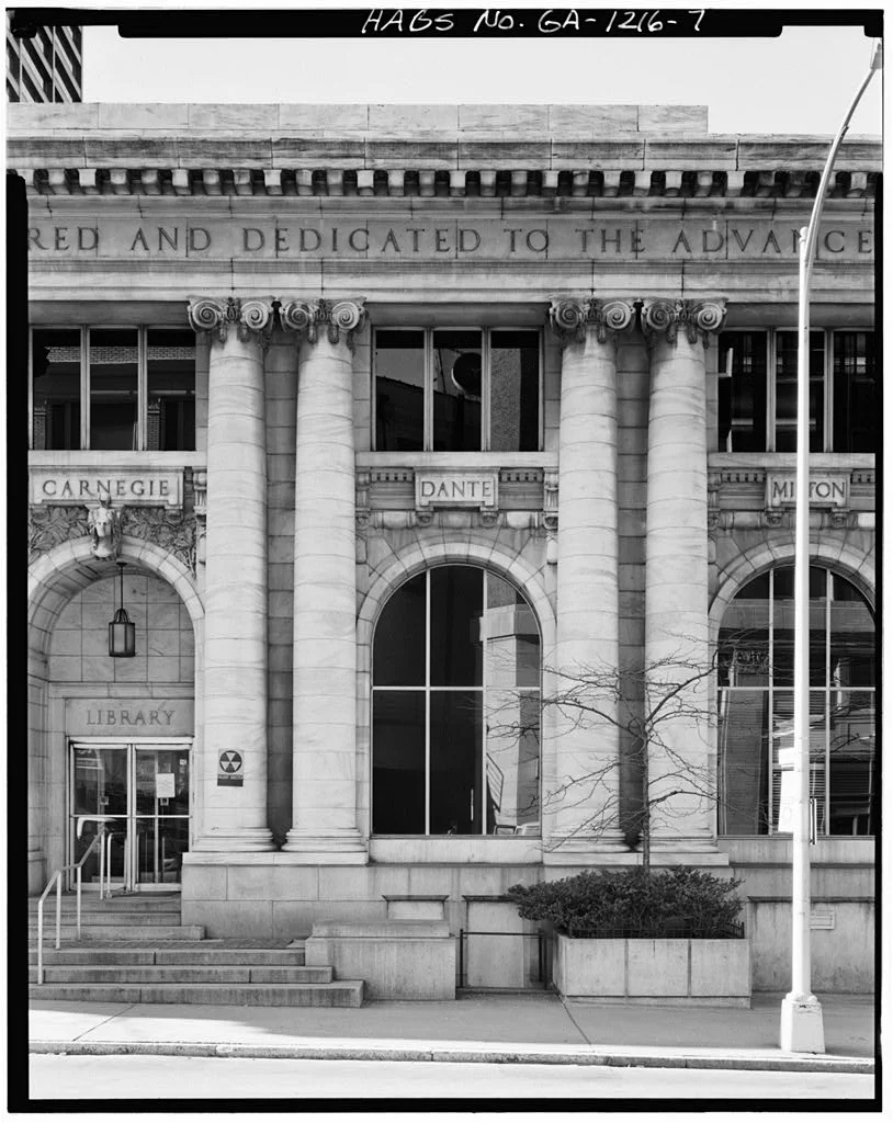 The former Carnegie Library in Atlanta, which was leveled in the 1970s. Portions of the library—including the marble friezes and cornices from the facade pictured here—are now scattered in a city dump. [Photograph courtesy of the Library of Congress.}
