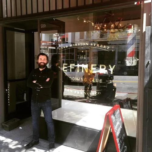 Originally from Atlanta, Georgia, Tony DiCaro is the owner and operator of The Refinery Grooming Club. Tony brings to the chair over a decade of experience as a cosmetologist, having trained at the Aveda Institute. After years of everything from fades and pompadours, to color jobs and big blow outs, Tony settled into his stylist sweet spot in San Francisco: precise short hair cuts and beard trims. Tony opened The Refinery Grooming Club in January of 2016, and is excited to do business in the Mission District. Working with a team of great stylists and barbers, Tony and the Refinery Team are redefining the men’s grooming experience. 