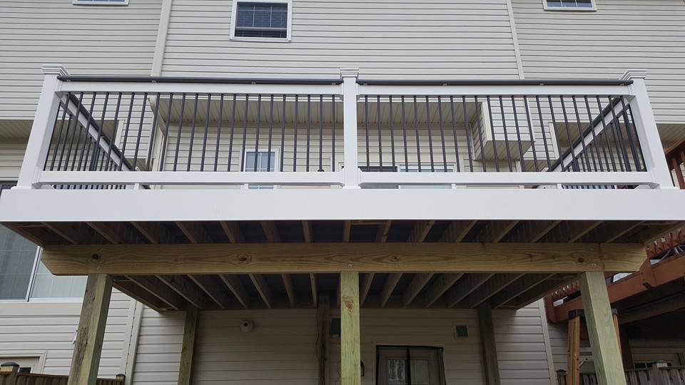 Second Level Deck with White Fascia, Black Balusters and Decking Rail Topper