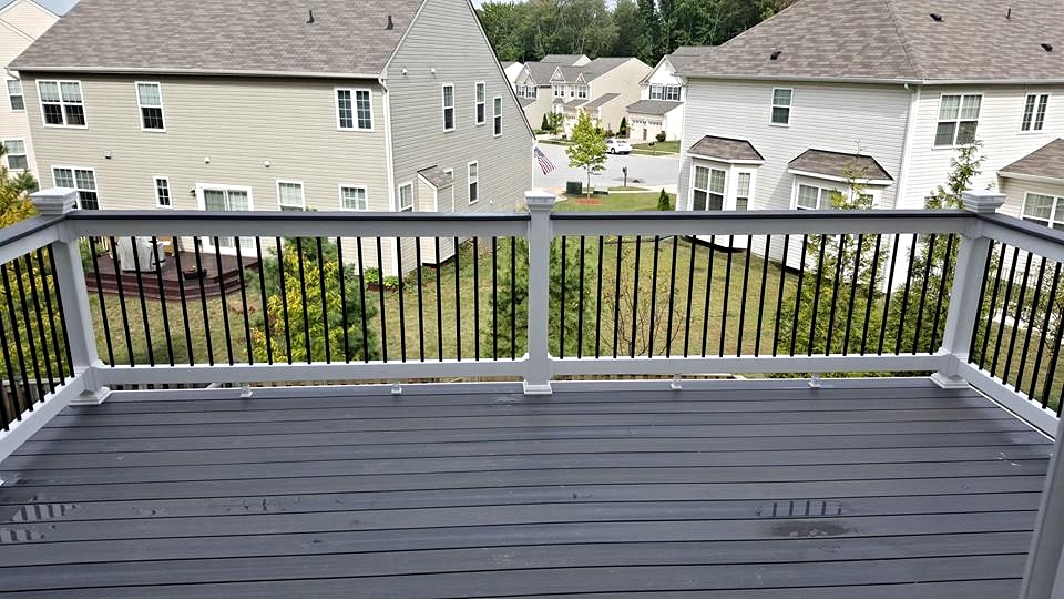 Gray Birch Deck with White Railings and Black Balusters