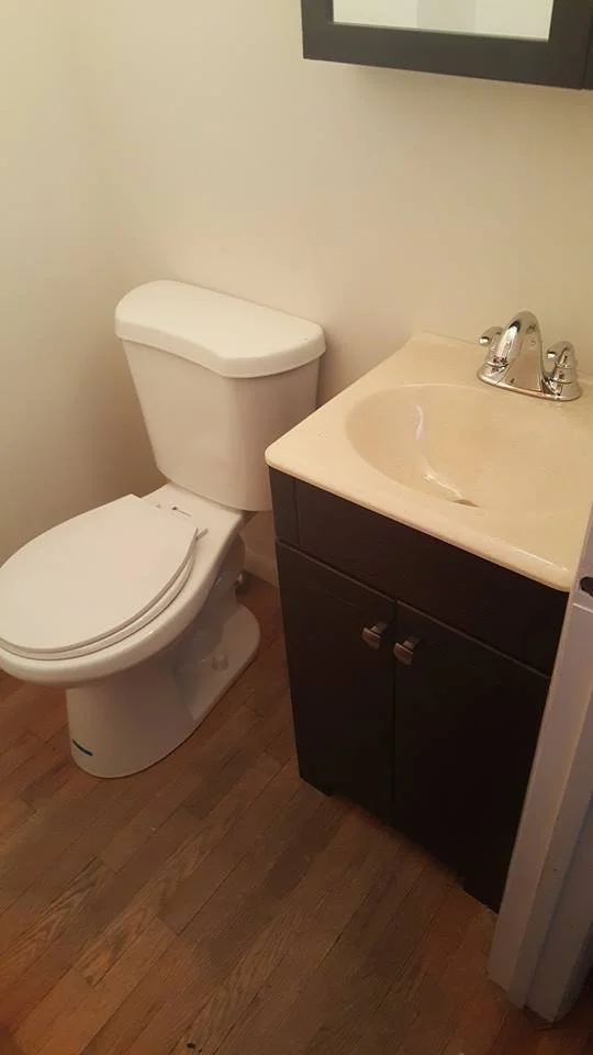Bathroom remodel with new floors and vanity