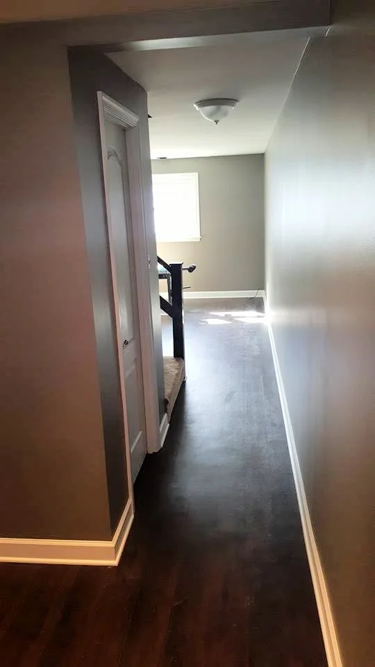 Basement Remodel - Hardwood flooring and drywall installation