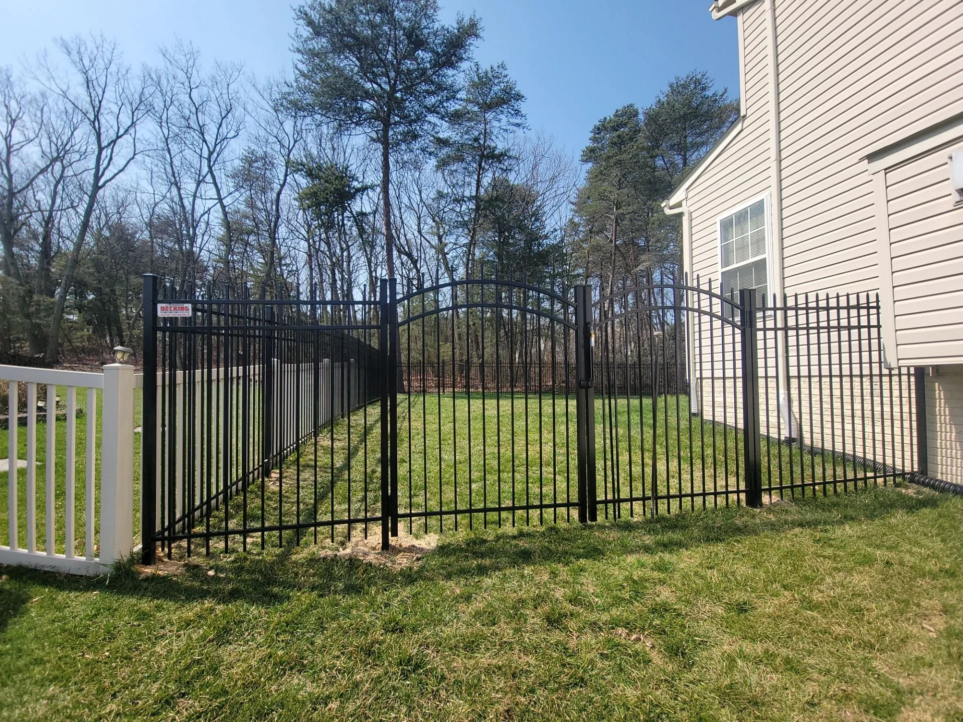 alum fence double arch gates.jpg