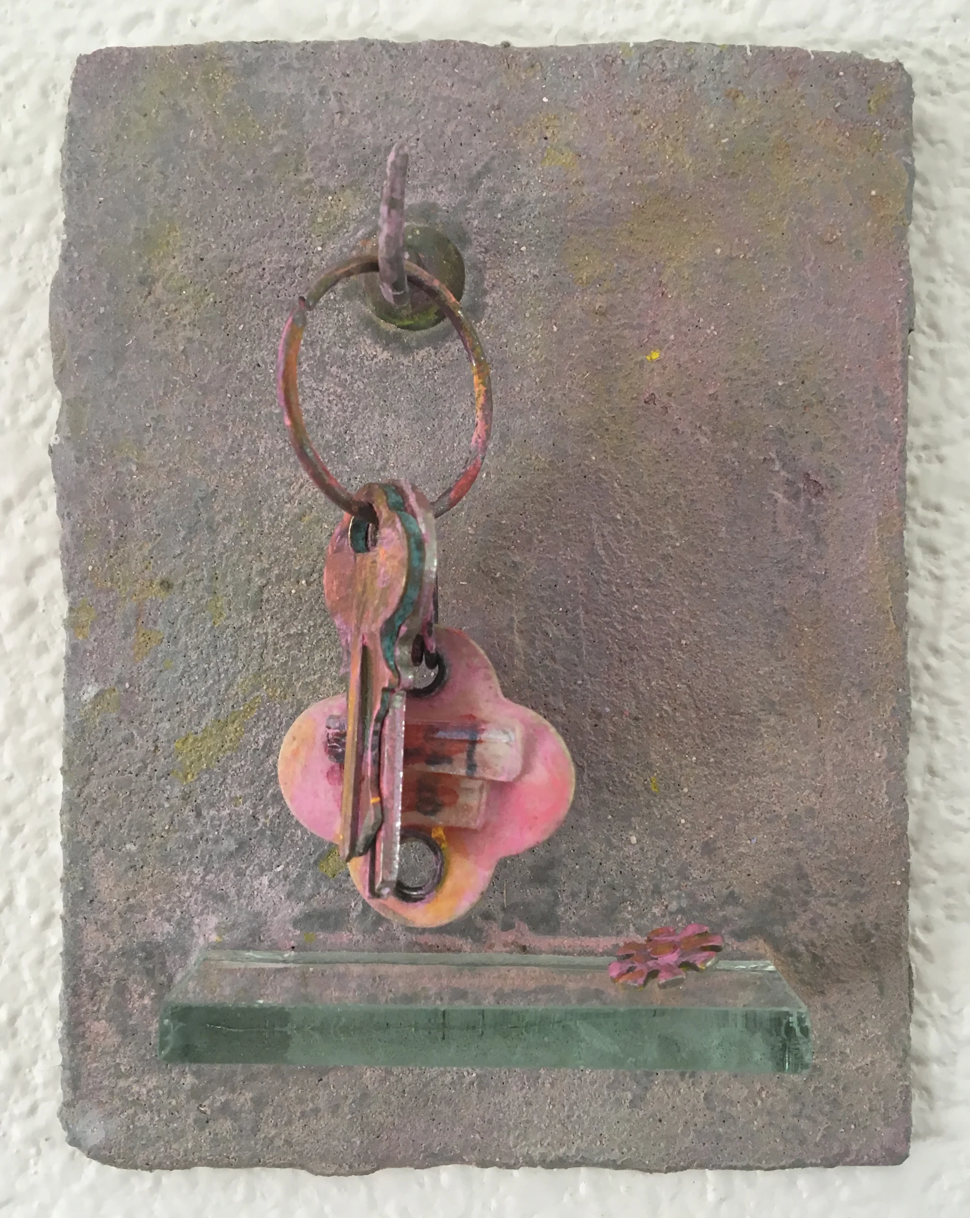  Glenda Forgot Her Keys  Found objects, glass, and pigment on hand formed cement panel  5 inches high x 3.5 inches wide 