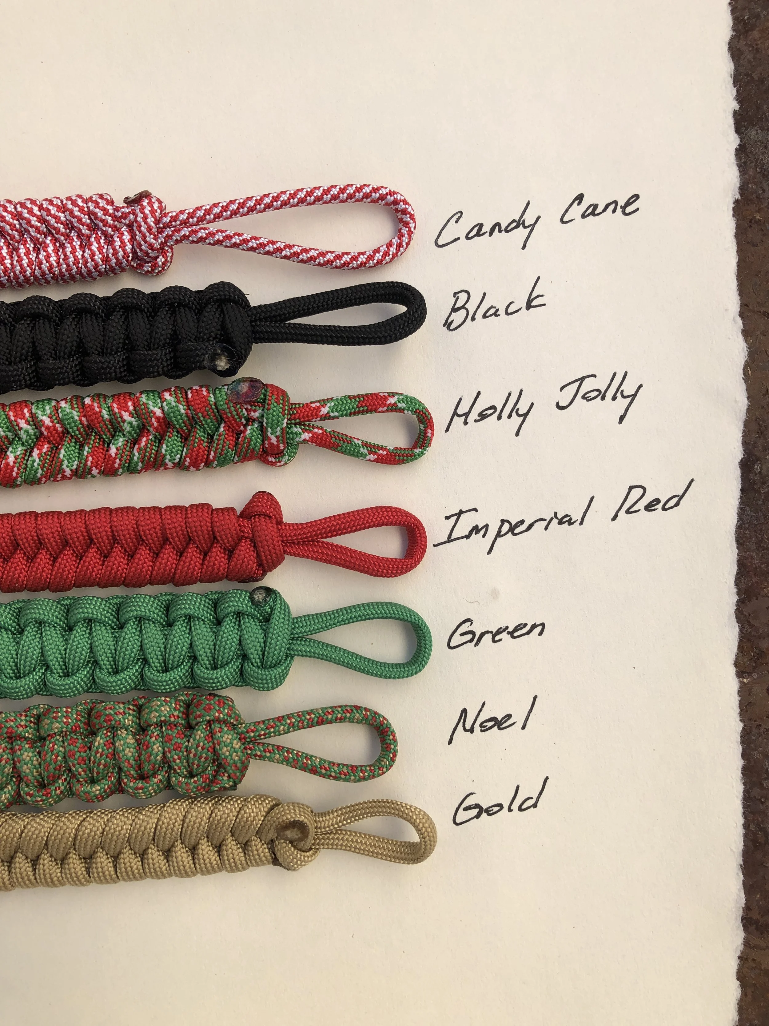 paracord color chart Christmas colors, hand woven samples on kraft paper