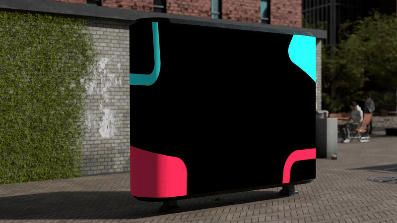 Public outdoor area with a black digital freestanding advertising display showing colorful curved shapes, with people sitting at tables and trees in the background. For TikTok.