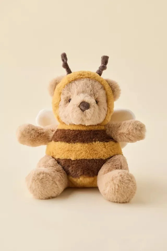 Stuffed bear in a bee costume