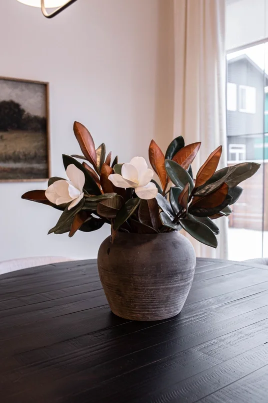 Faux Magnolia Branch Styled in a Rustic Vase