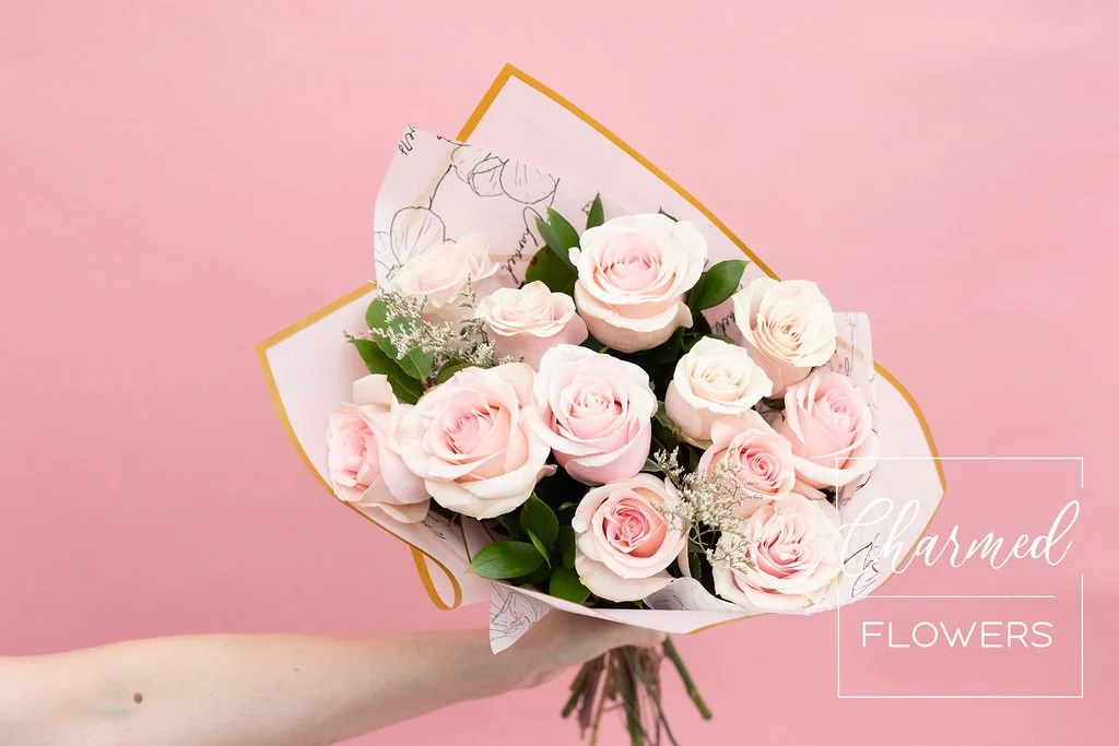 Valentine's Day Bouquet of Pink Roses wrapped in Pink Paper