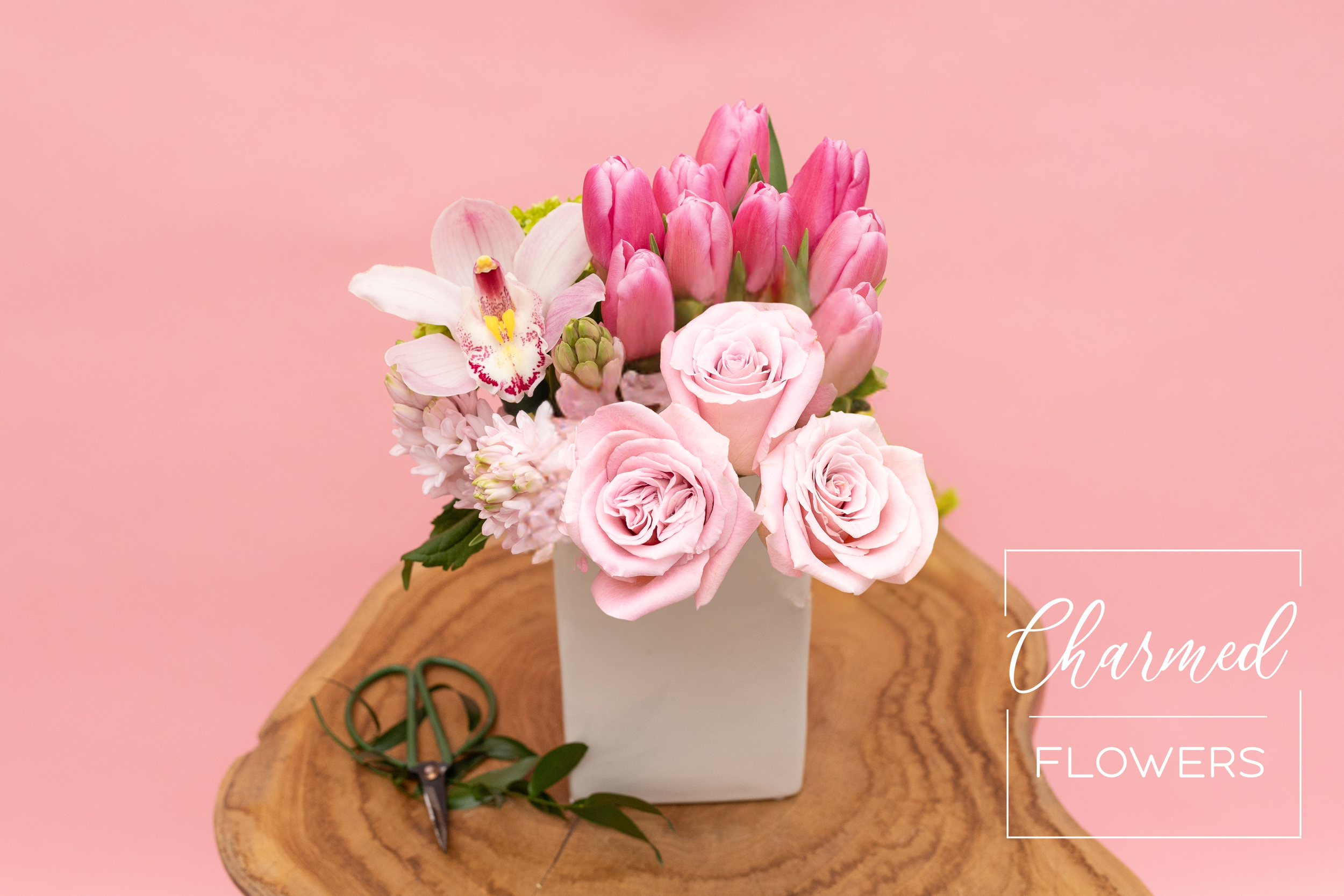 Charmed Flowers Modern Muse. Feminine, pink, and classy arrangment. Waterloo Florist