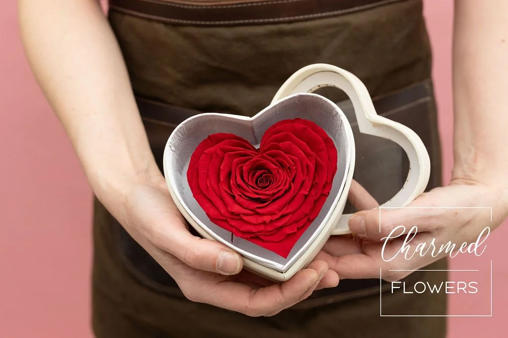 Charmed Flowers Enduring Love Heart Shaped Roses in a white Heart Shape box.