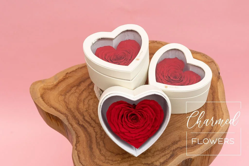 Charmed Flowers Enduring Love Heart Shaped Roses in a white Heart Shape box.