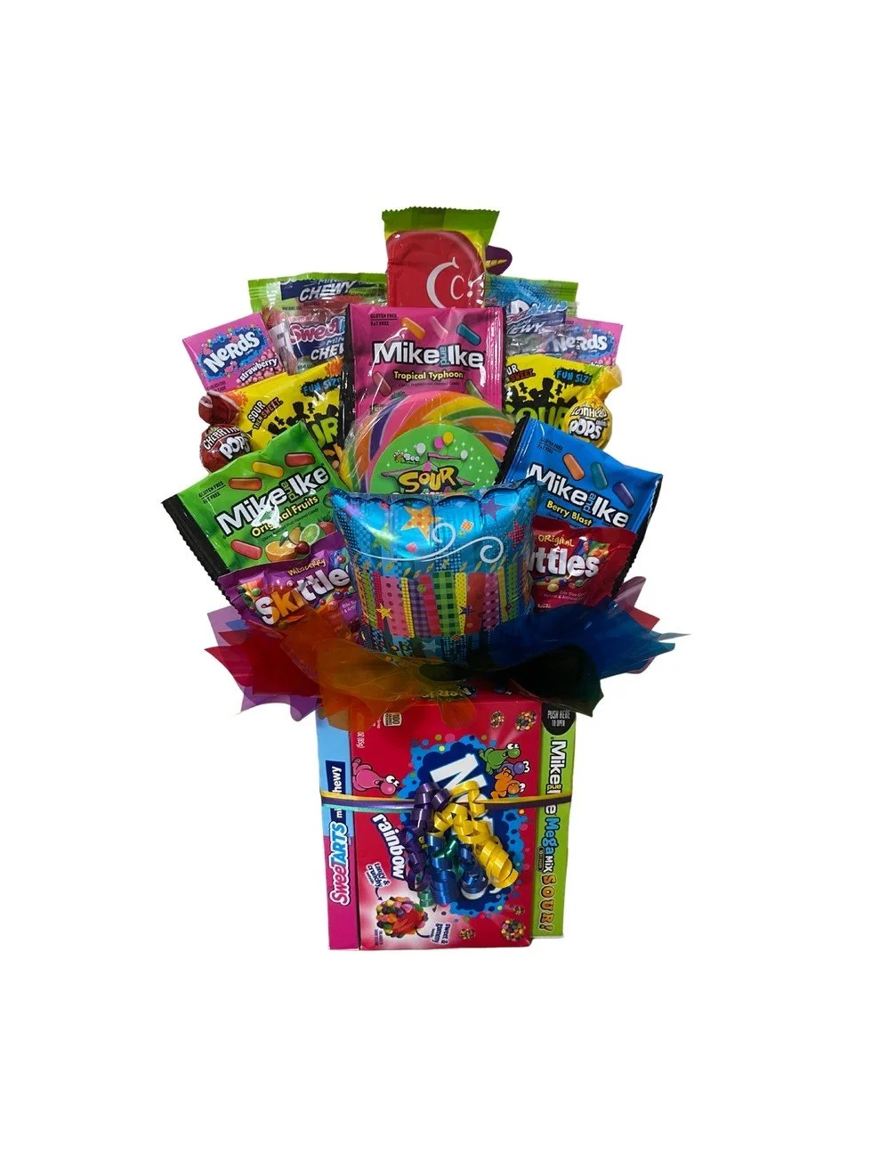 A assortment of candy arrange into a bouquet.jpg