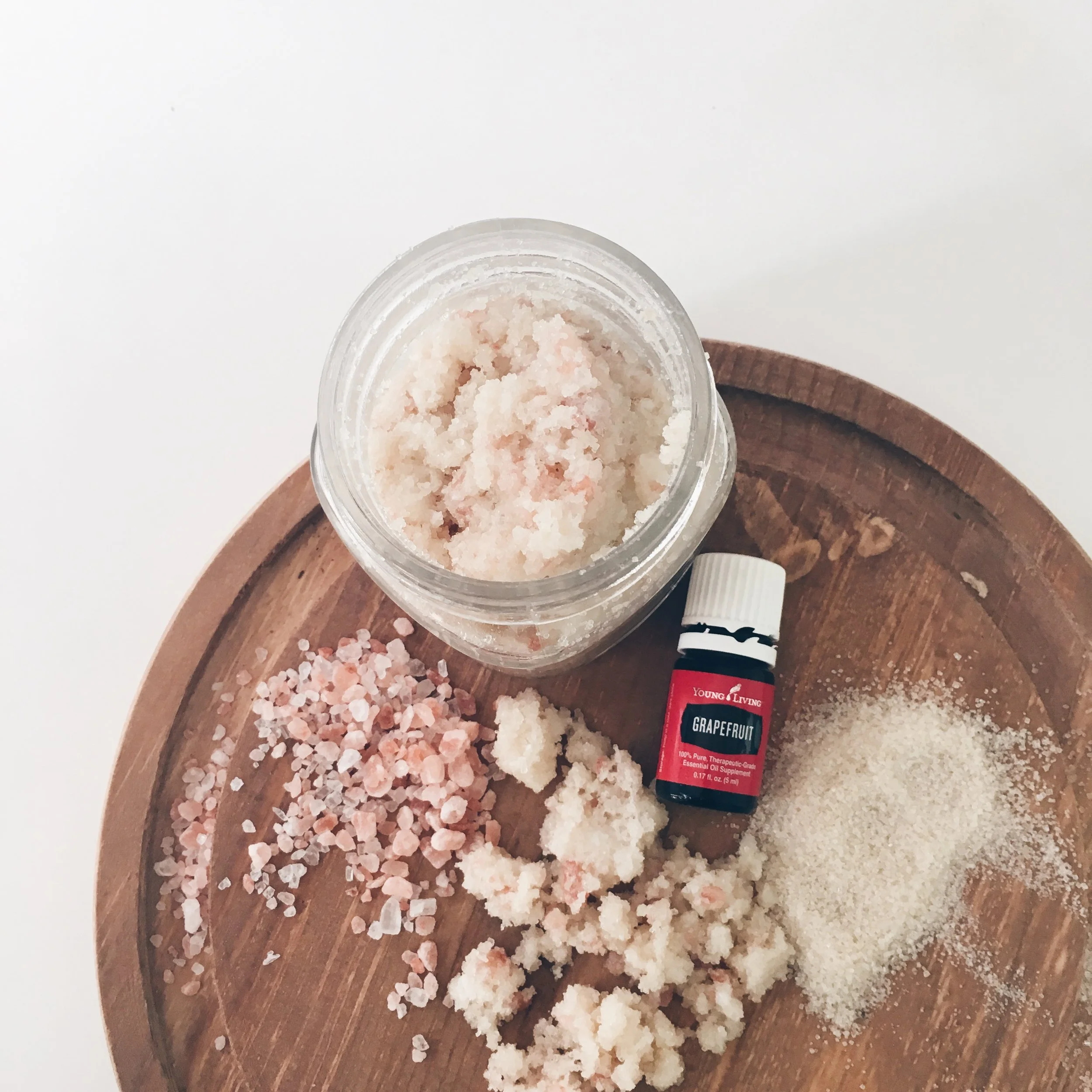 SUPPLIES: 4 ounce Glass jars Organic Cane Sugar Organic Coconut Oil Almond Oil Himalayan Sea Salt Vitamin E Oil Pink Food Coloring (optional) Grapefruit Essential Oil I have been using essential oils since July 2014. I am super passionate about them and living as chemical free as possible! I once read that as women, we put as many as 80 chemicals in or on our bodies by breakfast time. GAH!! That is crazy! I have switched to using all natural makeup, changed out a lot of my facial products to Young living products and I love making chemical free perfumes and body sprays like these to replace those yucky things that I would normally be using! If you want to chat more about this with me, shoot me an email !! I would love to chat!!