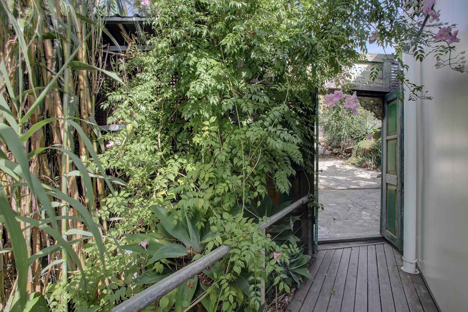 Snug walkway to main house front door