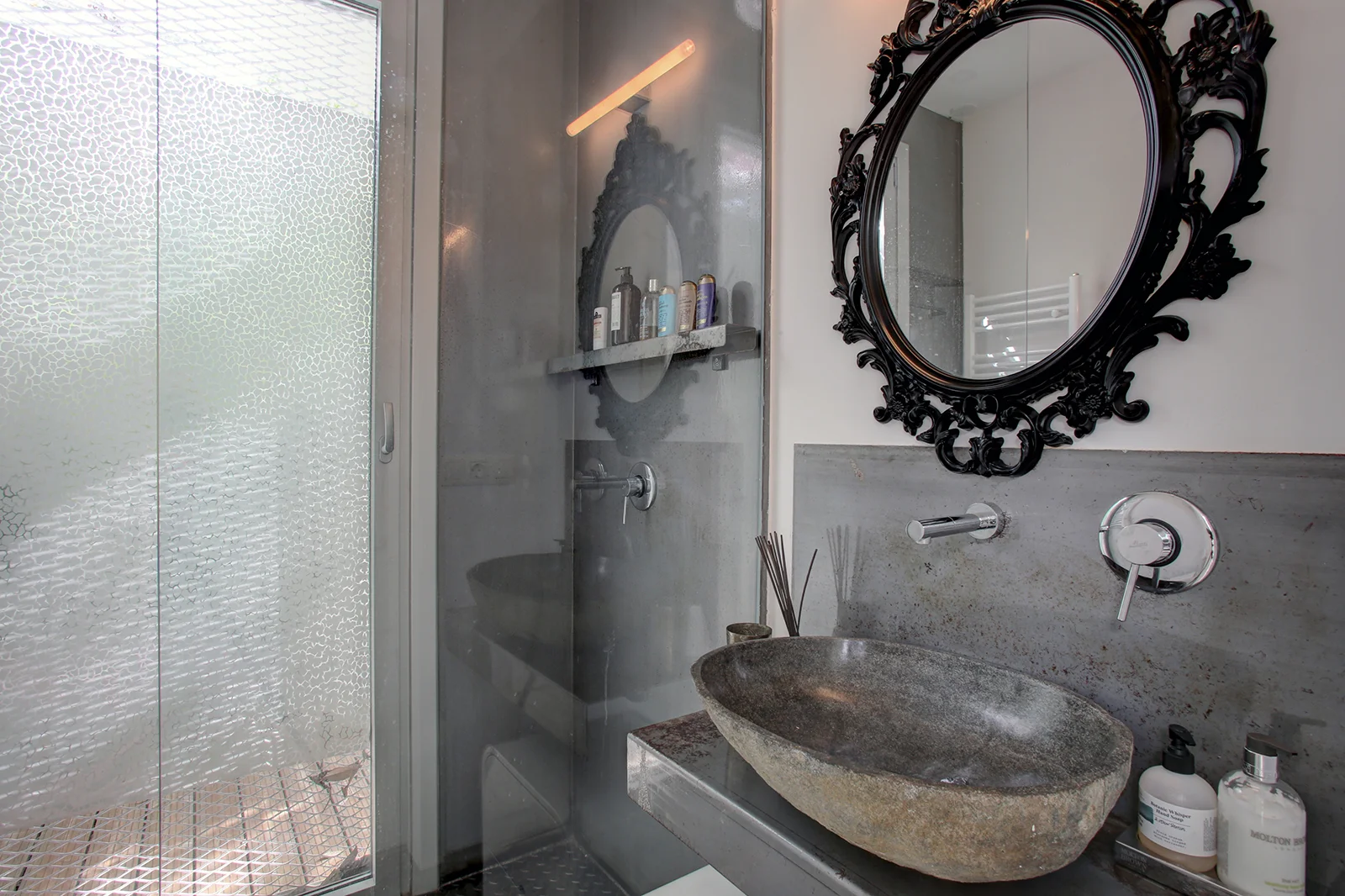 Bedroom 1 ensuite bathroom and indoor / outdoor shower