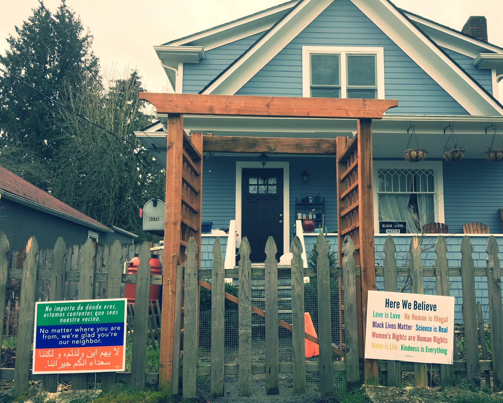  "No matter where you're from, we're glad you're our neighbor."  "Here we believe love is love, no human is illegal, Black lives matter, science is real, women's rights are human rights, water is life, kindness is everything."  #blacklivesmatter #NoD