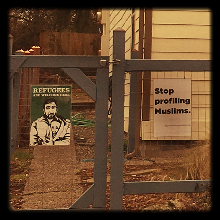  "Stop profiling Muslims."  "Refugees are welcome here." 