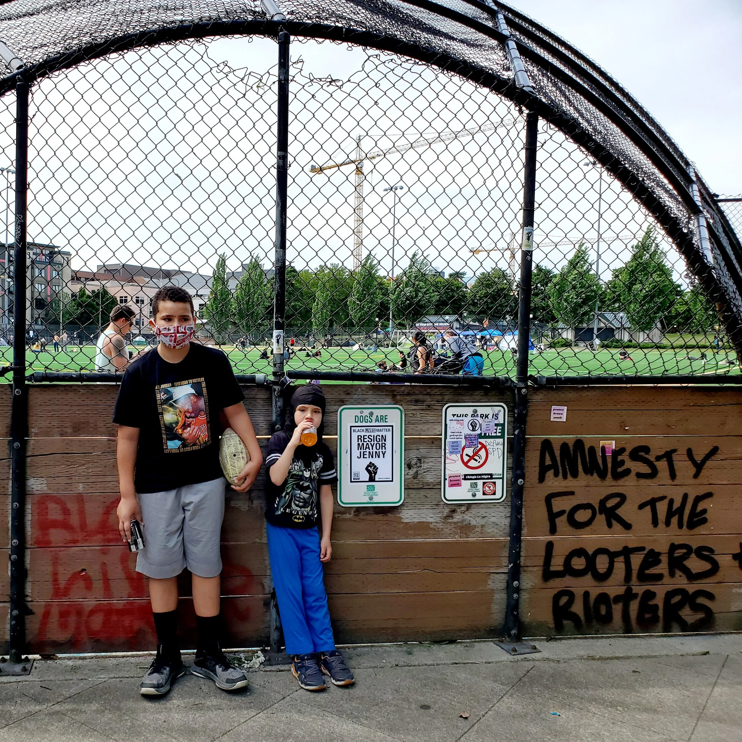 Leaning on a liberated backstop. Photo by Matt Halvorson.