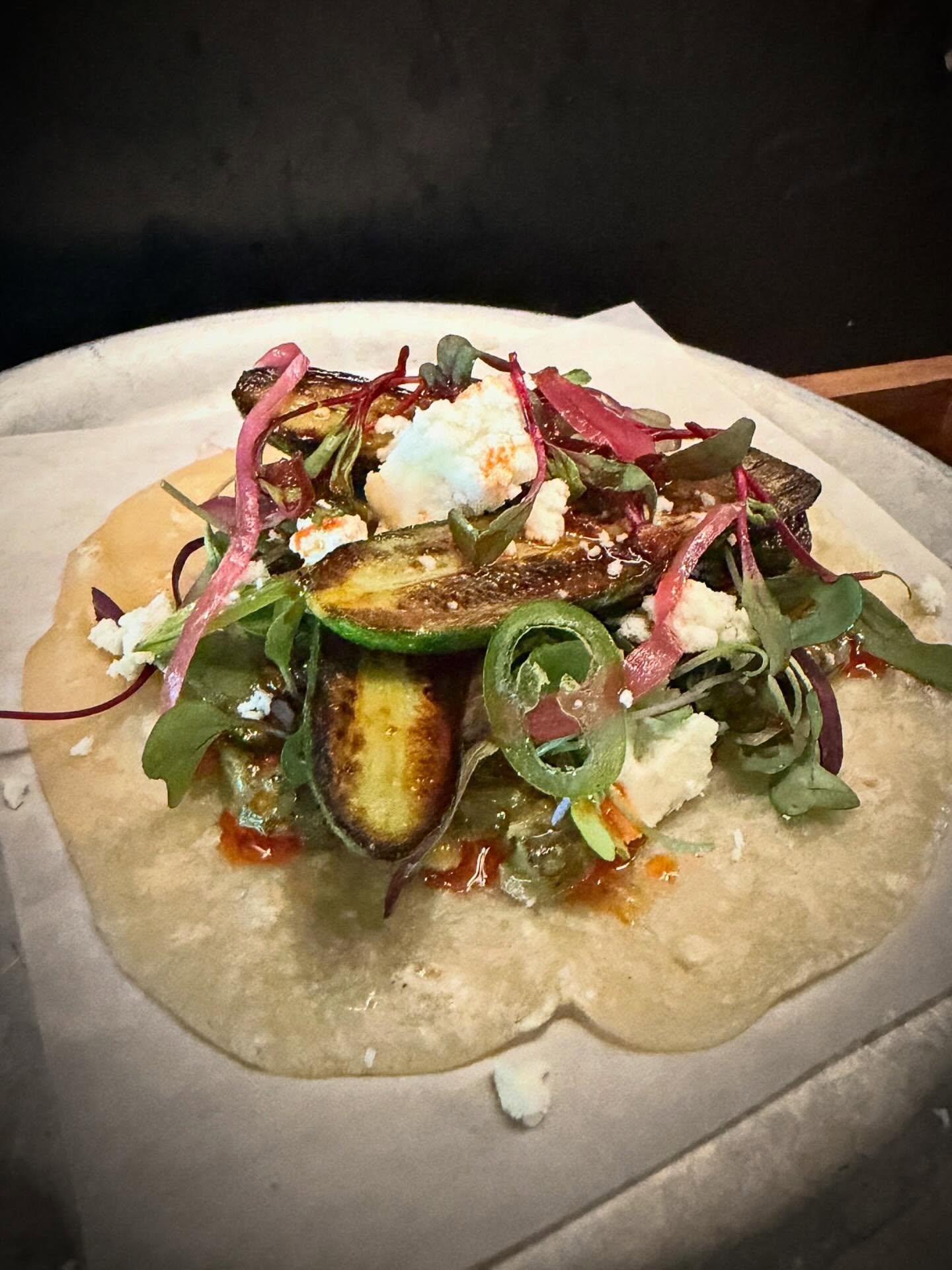 Baby Zucchini / greens, queso fresco, pickled red onion / mint pistachio pistou / Lemon