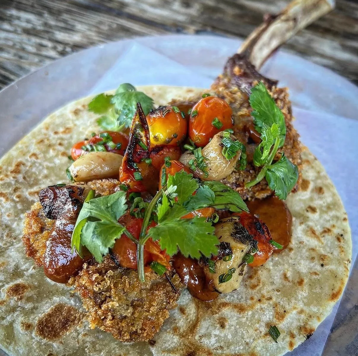Lamb Milanese Taco / Garlic Confit, Blistered Tomatoes, Parsley, Chili Negro Emulsion