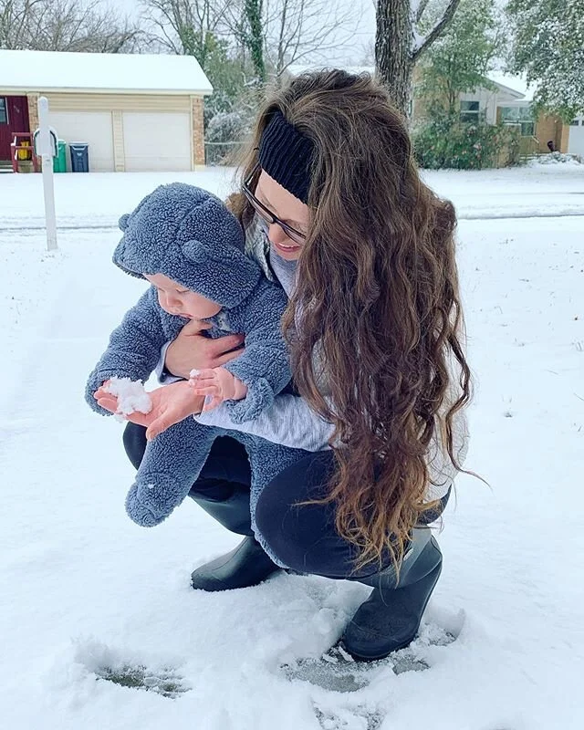 Yesterday it was 70 degrees...we woke up today to a rare Texas snow. I continue to be absolutely traumatized by the Texas weather #texasweatheriscrazy #maverick #babysfirstsnow