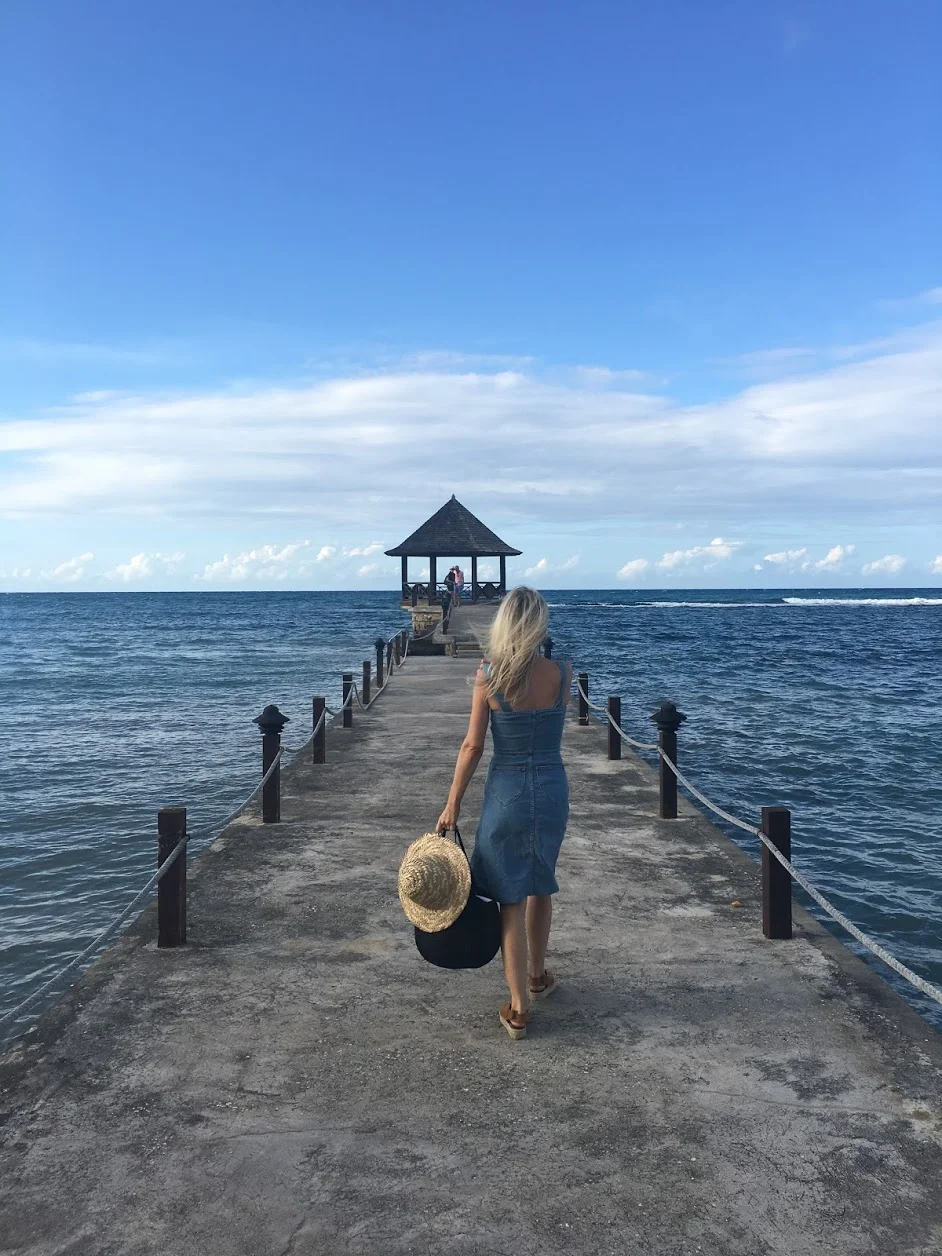 Ph: In Jamaica at the Tryall Club, holding my trusty Clare V basket bag Photographed by Tom Schirmacher