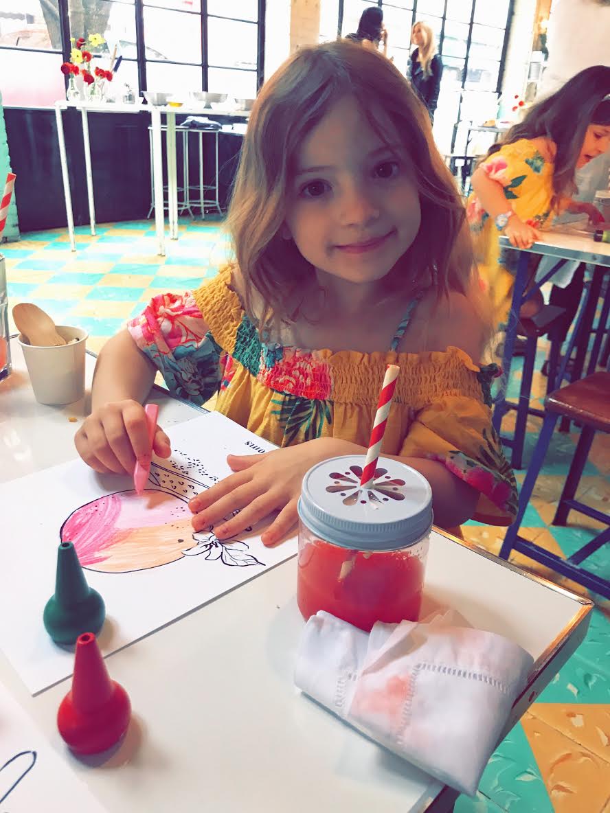 Ph: Honor colouring and sipping on her festive and delicious watermelon juice - at Tacombi
