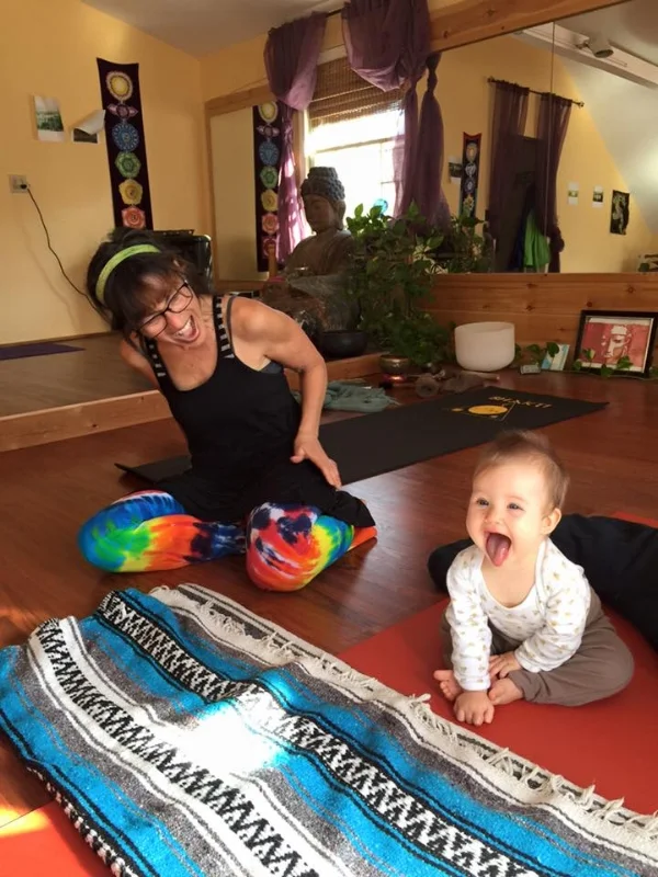 Judy Apicella with a very young yogi