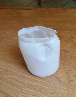 Eclair's well-loved empty protein powder jug.