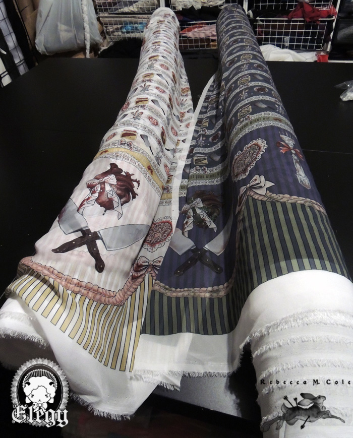 ^Yay for fabric :D Sorry for the crap lighting - it was super overcast when I first took these, so the original photos with natural lighting were so dark I had to retake them with the lighting in my studio. Even though the putrid colorway looks dark and grungy here, I promise it's not! It's just as lovely and grey as in the samples I posted <3 All the fabric actually came on one roll, so I had the pleasure of rolling the putrid onto a new one, which is tedious and annoying and explains why the putrid colorway is on the roll so sloppy.