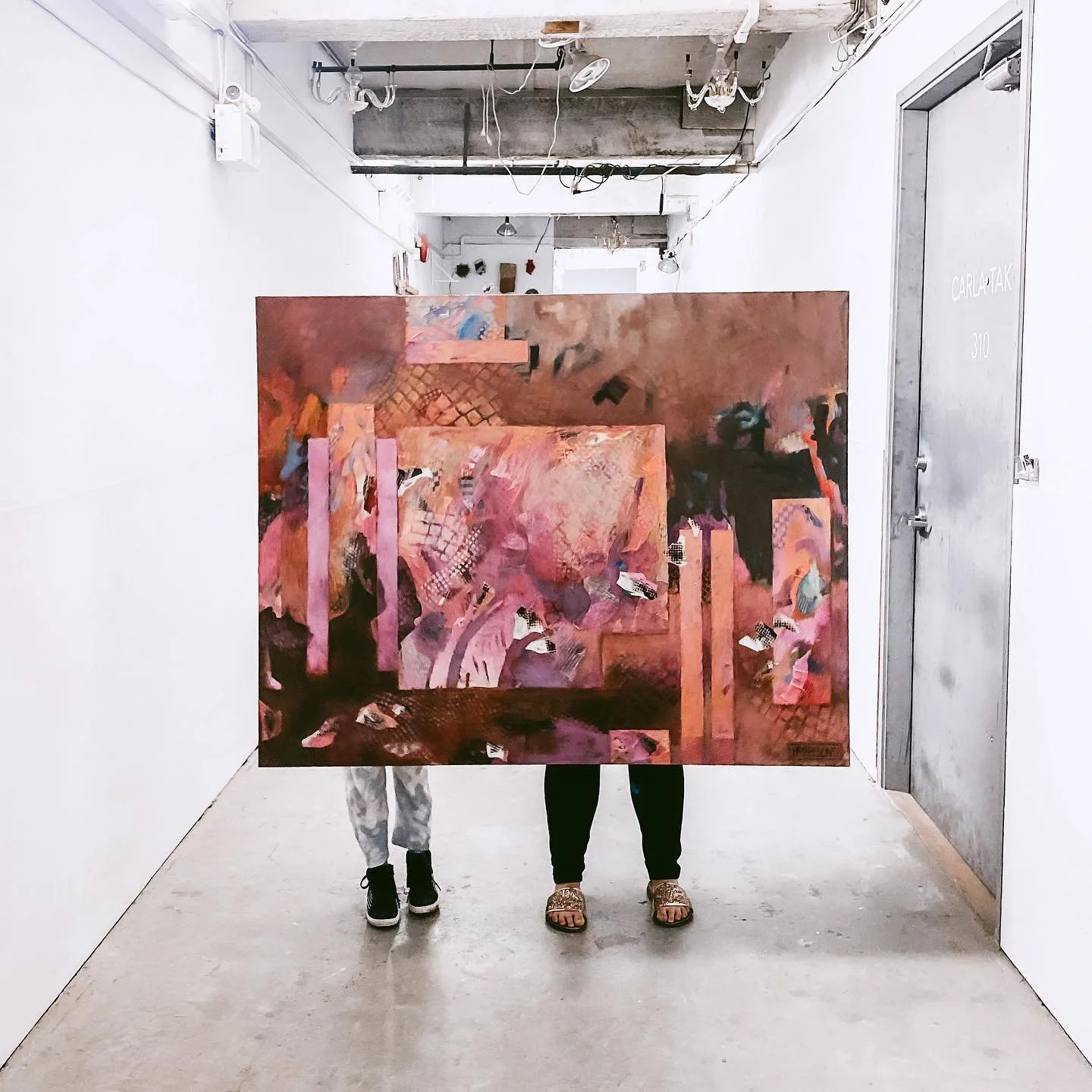 My mom is an artist. She painted this and then she said my sister (right) could have it but it wouldn&rsquo;t fit in the car so we had to get it to her place by holding onto it out the window. Like, it was outside the car but I was inside the car, an