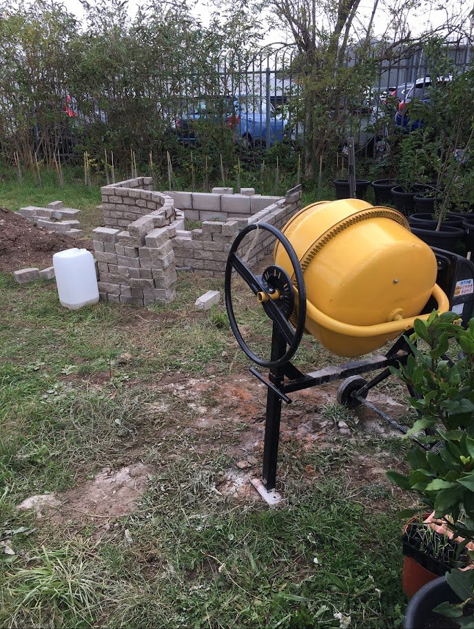 brick raised beds building.jpg