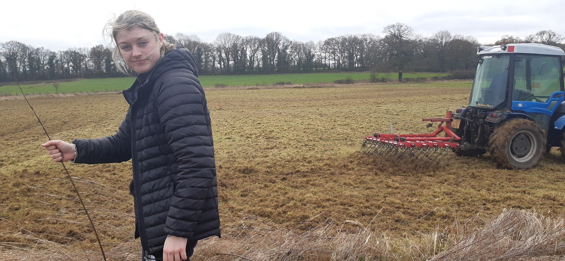 tractor scarifying field.jpg