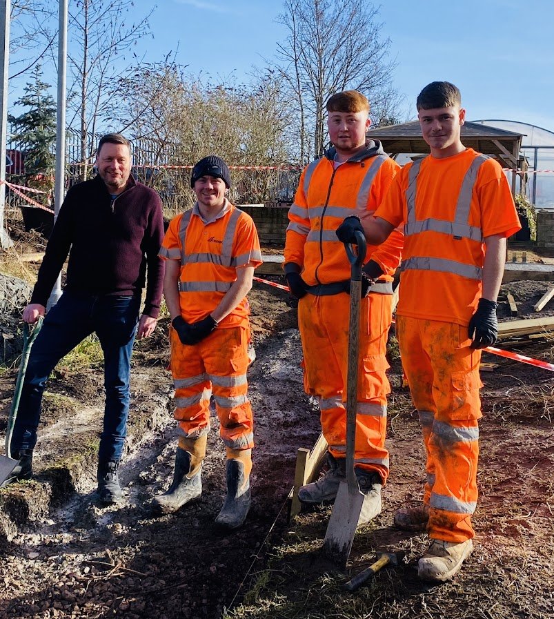 Cemex UK creating concrete disabled access pathway in Stratford upon Avon for charity.jpg