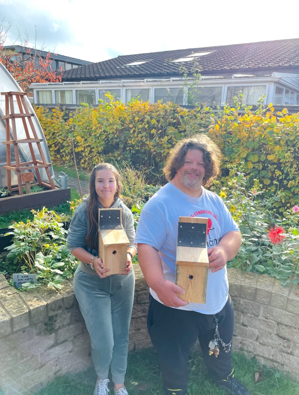 vounteers create bird boxes for garden.jpg