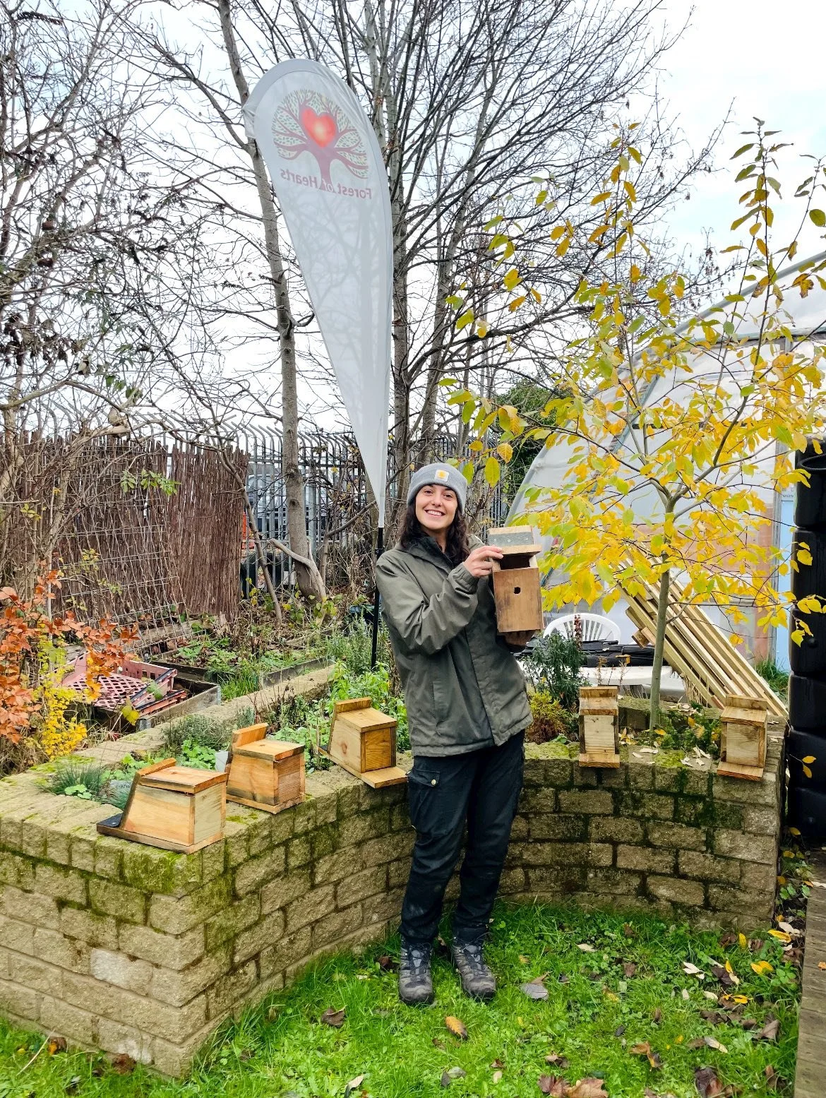 volunteer with a bird box.jpg