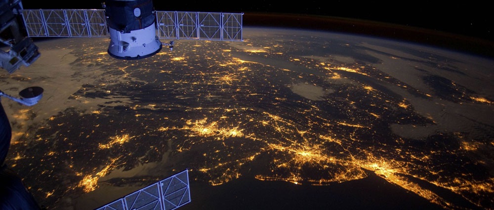 Eastern Seaboard (USA) at night – An Expedition 30 crew member aboard the International Space Station took this nighttime photograph of much of the Atlantic coast of the United States. Large metropolitan areas and other easily recognizable sites from the Virginia/Maryland/Washington, D.C. area are visible in the image that spans almost to Rhode Island. Boston is just out of frame at right. Long Island and the New York City area are visible in the lower right quadrant. Philadelphia and Pittsburgh are near the center. Parts of two Russian vehicles parked at the orbital outpost are seen in left foreground. Image Credit: NASA