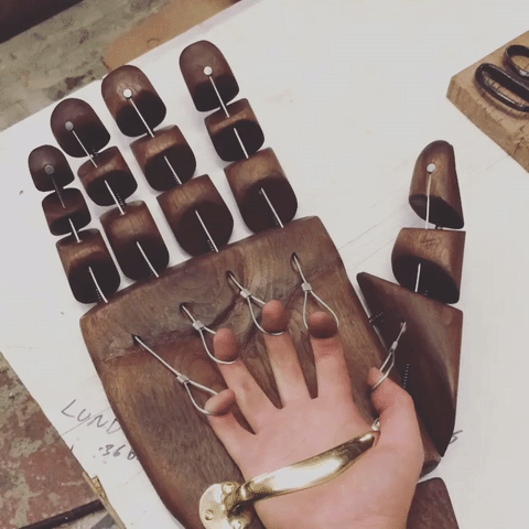 A fully articulated wooden mechanical hand
