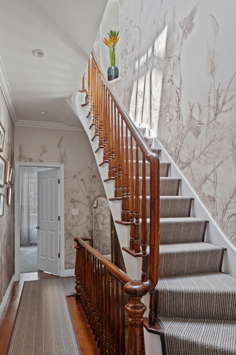 Stairs Custom Wallpaper from Area Environments Custom Wool Runner from Crosby Street Studios Carrick Leaf Wall Light from Vaughan