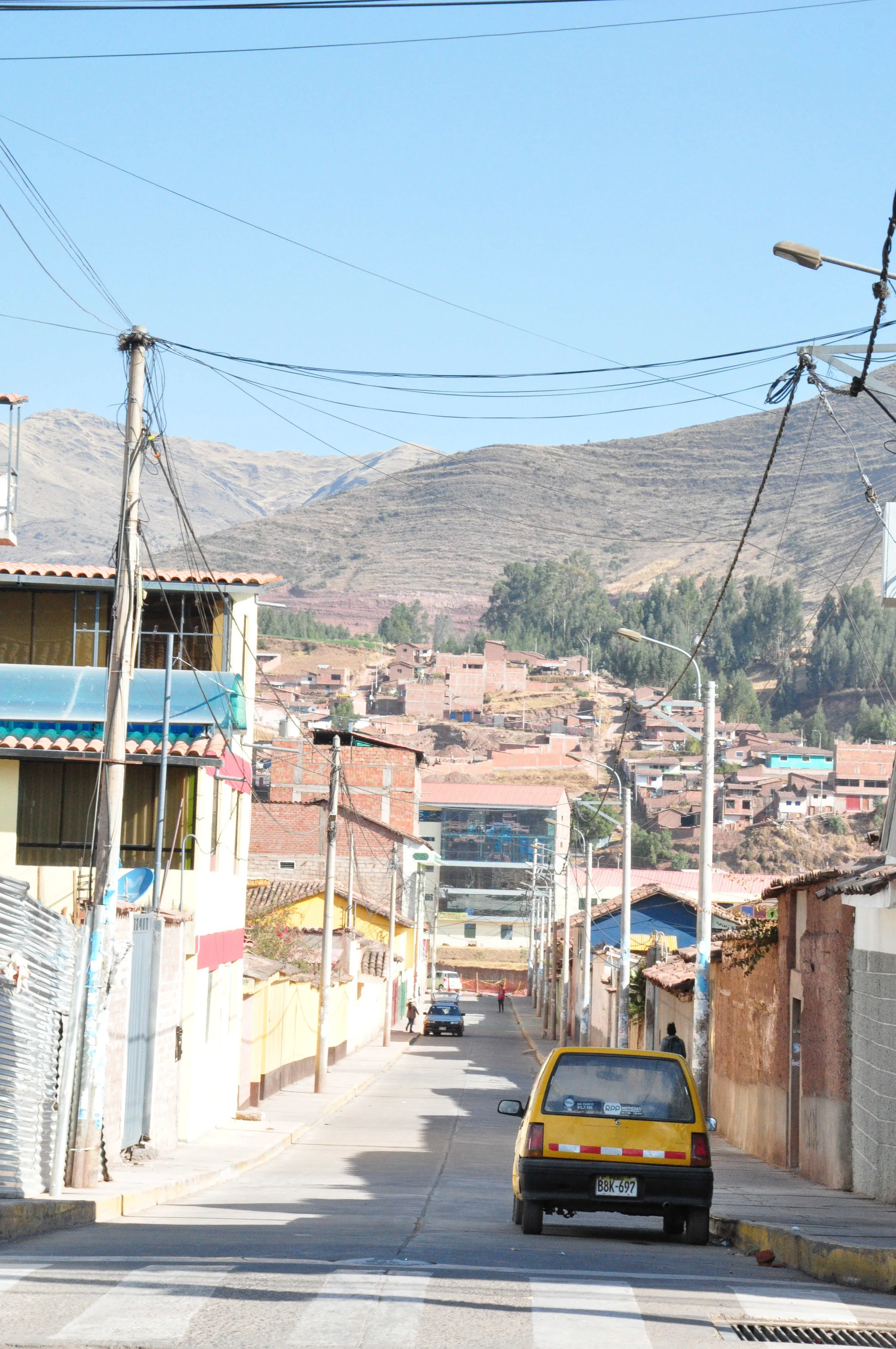  Typical street view in Cusco with mountains on all sides, although usually much more traffic. 