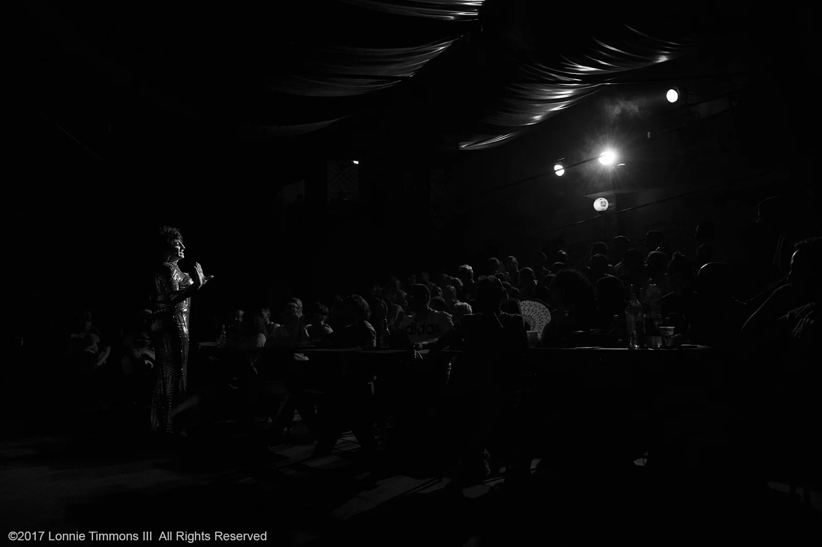 Cinthya sings during the Show de Travestis on July 2, 2017. Travel photography by Lonnie Timmons III. Copyright 2017 Lonnie Timmons III All Rights Reserved. 