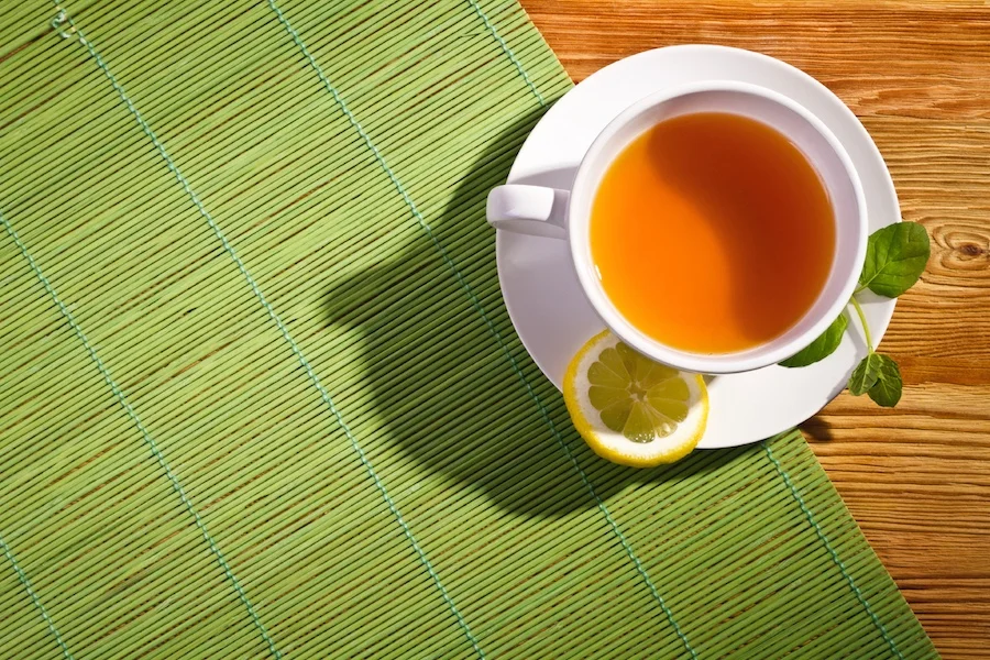 stock-photo-60006730-cup-coffee-and-sunny-trees-background.jpg