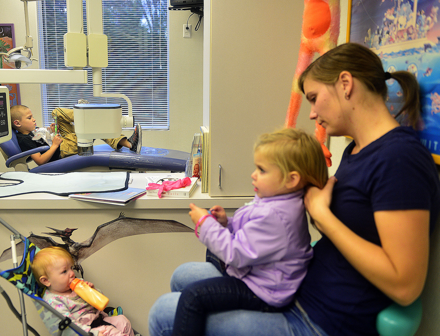  Colton waits his turn to see the dentist as Kelsey sits with Hadley and a friend's daughter, Charlotte, 1, at the Children's Dentistry of Gales Ferry on Thursday, Nov. 16, 2017. Charlotte is the daughter of Jessica Whitman and her husband, Jacob, wh