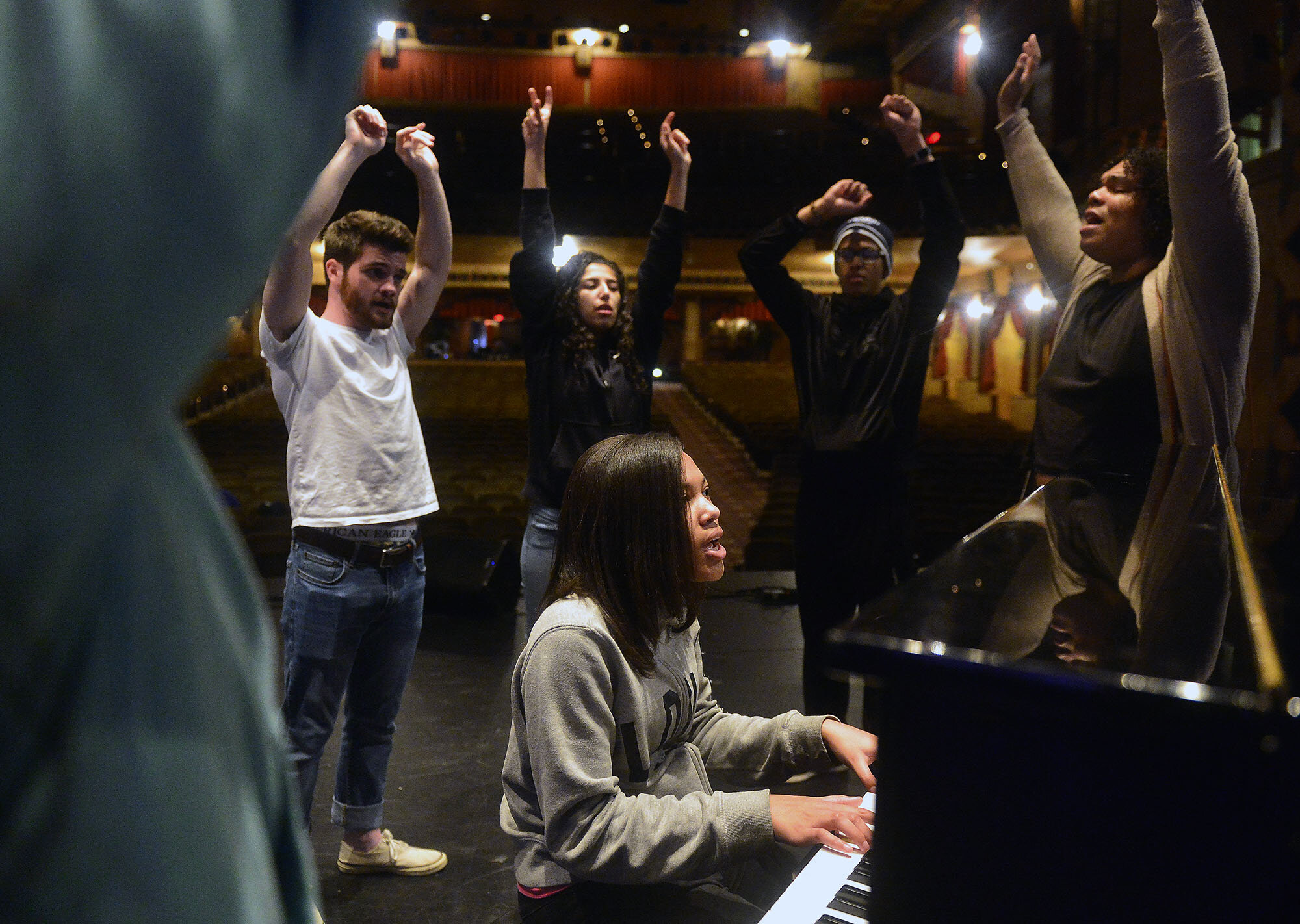  Joy Garrett, an eigth grader at Bennie Dover Jackson Middle School, plays the piano as she warms up with other singers during rehearsals for the New London Talent Show on Thursday, April 5, 2018 at the Garde Arts Center in New London. The 8th annual