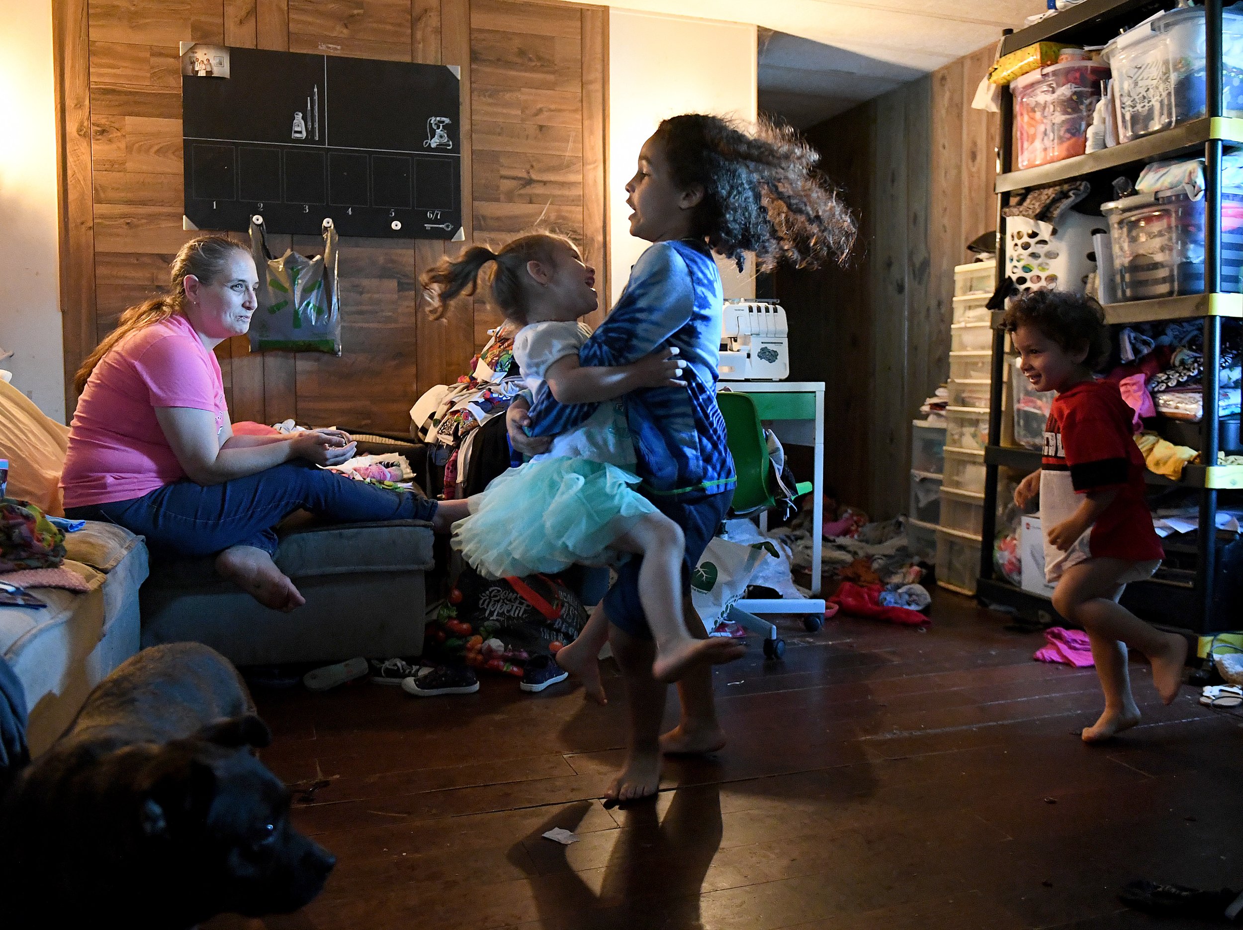  Amryn Valero , 8, dances with his sister Esme, 3, as their mother Aleshia Valero and brother Emerson, 3, look on as they have an impromptu dance party at their home in Groton on Wednesday, June 22, 2022.  Valero, who lived at New London’s Crystal Av