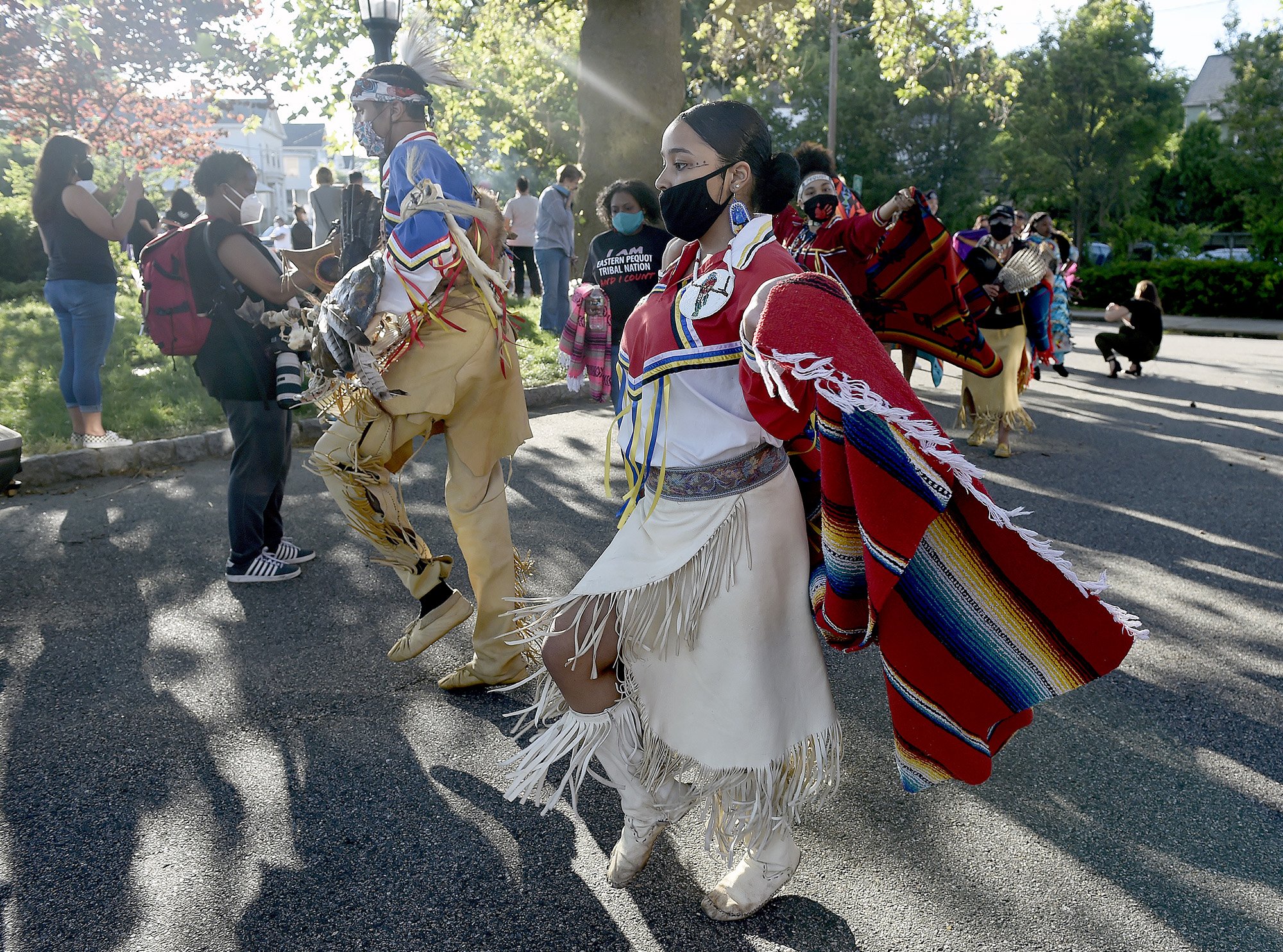  Sequoiah Burrello and her brother Ridge, of the Narragansett Indian Tribal Nation, participate in a traditional dance during a rally to recognize the removal of the Christopher Columbus statue at Columbus Square in New London on Wednesday, June 17, 