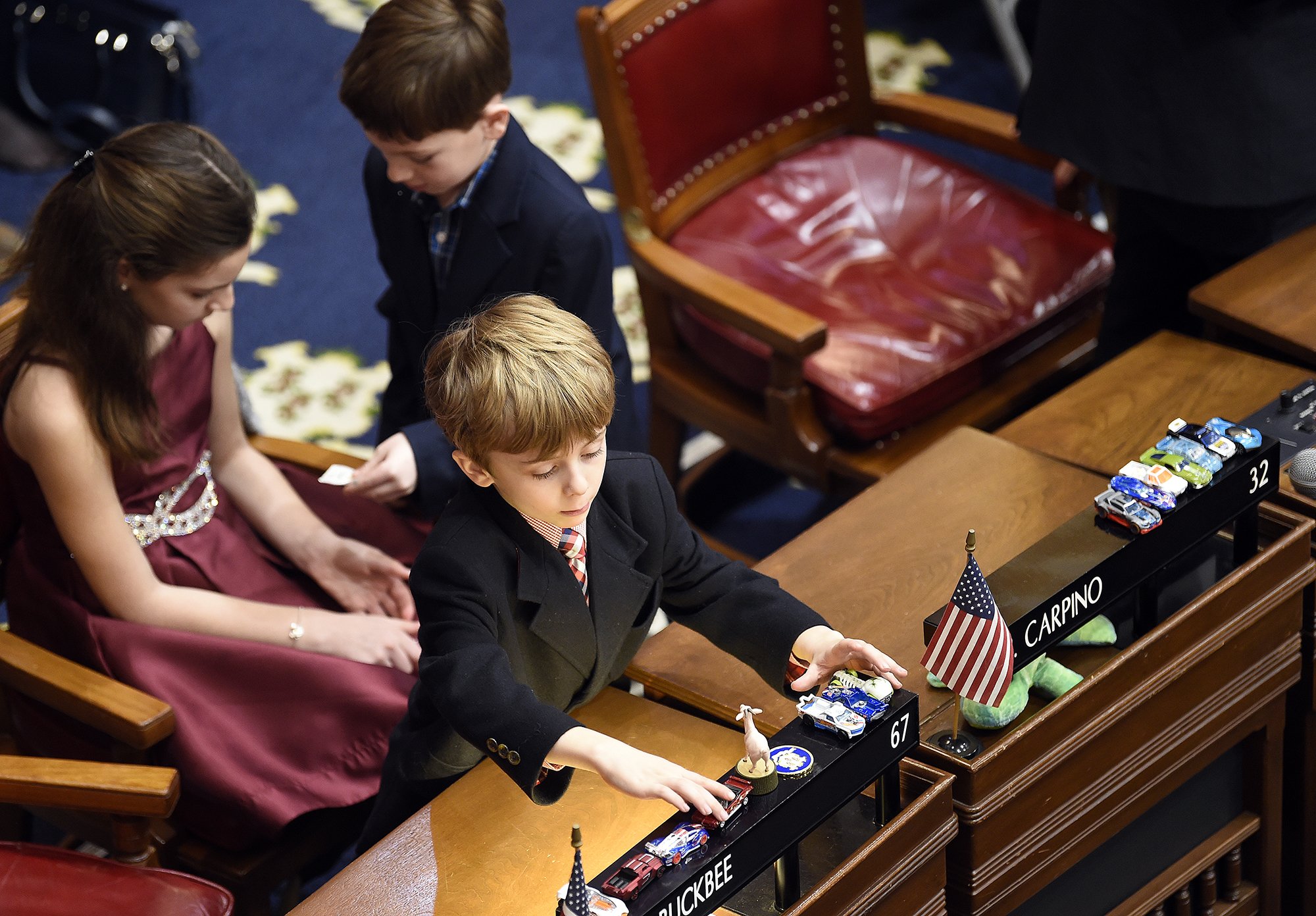  William Petit III, 4, of Guilford, plays with toys during a break in session for the State Representatives where his father William Petit represents the 22nd district during the opening of the Connecticut General Assembly session for 2020 on Wednesd